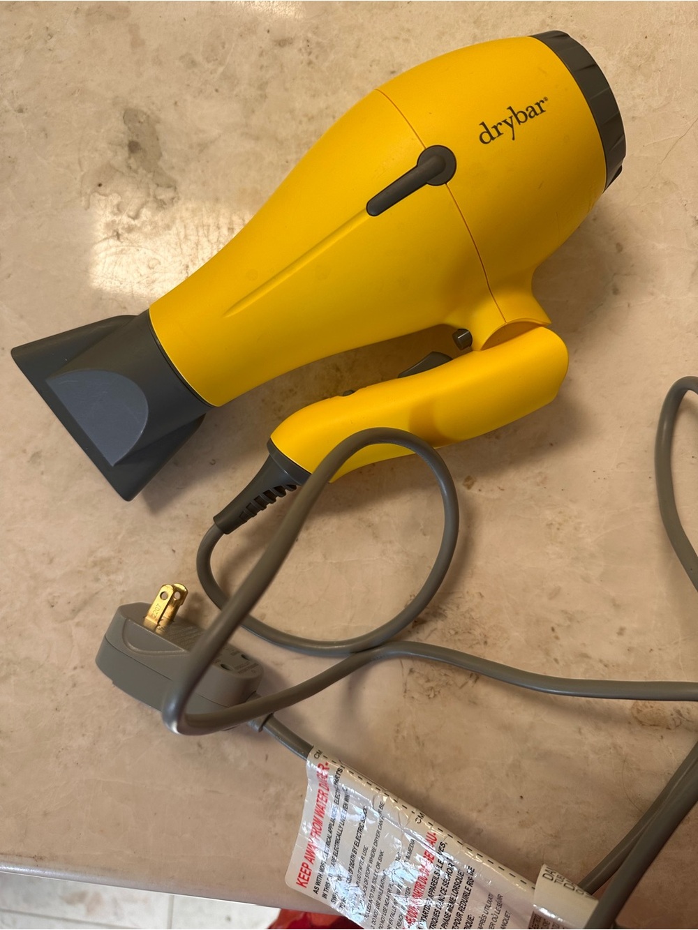 Drybar Yellow and Gray Foldable Travel Hair Dryer